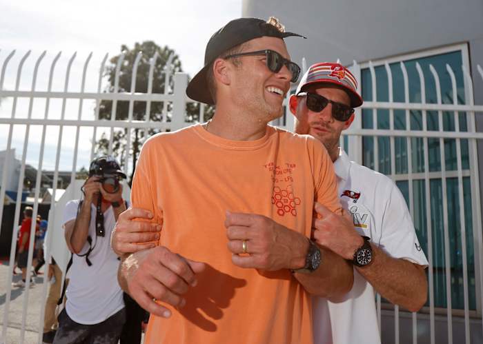 Tampa Bay Buccaneers quarterback Tom Brady (left) and quarterback Ryan Griffin after a boat parade to celebrate victory in Super Bowl LV against the Kansas City Chiefs.